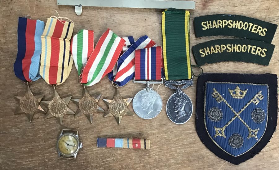 WWII group of medals and badges to 7886456 Cpl B.P. Barker 3rd County of London Yeomanry (A.K.A