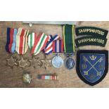 WWII group of medals and badges to 7886456 Cpl B.P. Barker 3rd County of London Yeomanry (A.K.A