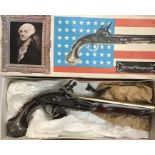 A Replica of George Washington’s flintlock pistol in Original Box. Approximately 35cm long. (lock