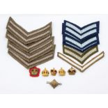 A collection of Rank Insignia, including a WWI Lance Corporal Chevron, five later Army Corporal