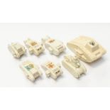 A collection of 7 WWI interest crested china tanks, to include: 2 Grafton China examples; a Willow