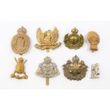 A selection of Yeomanry badges including a Lothians and Border Horse Yeomanry brass cap badge, a