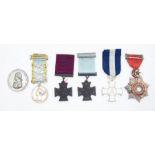 A selection of reproduction medals. To include: a Victoria Cross army issue, a Victoria Cross