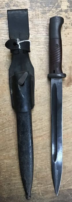 German WWI (WWII issued) bayonet with scabbard and frog (not matching serial numbers). 10” blade.