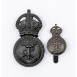 Two WWI British Royal Navy interest cap badges, including a die stamped blackened brass badge for