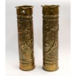 A pair of French 75mm brass shells, 1917 dated, both hand worked with hammered and repousse