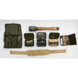 A selection of military surplus and sundry military related items to include; a cased Lee Enfield