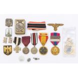 A mixed lot containing a 1936 Spanish Civil War medal with ribbon and pin, a Bavarian 25-year