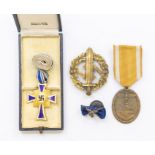 4 items of German WWII interest, to include: a gold grade German Mothers Cross with original neck