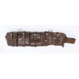 A Swedish WWI era leather Bandolier ammunition pouch, approx 44" length, faintly marked INF1 Good