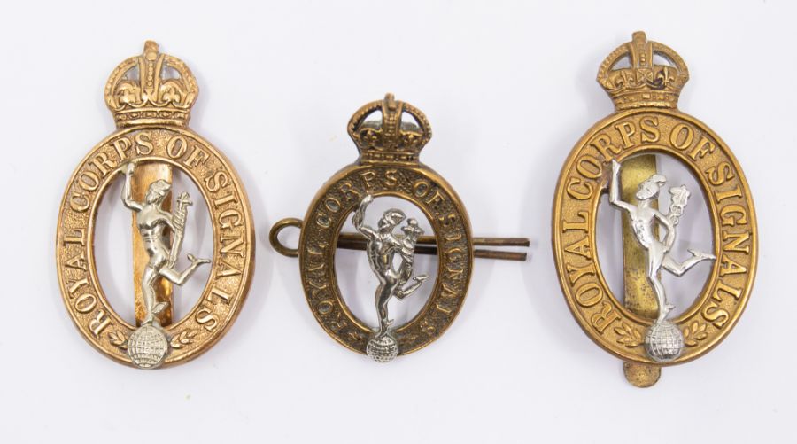 Three inter war period (post 1921) Royal Corps of Signals bi metal cap badges, two with sliders, two