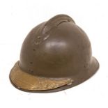 French WWI Adrian helmet with brass visor memorial plaque. Complete with 6 tongue leather liner