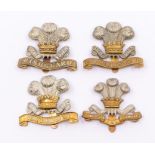 Four Welsh Yeomanry interest cap badges including a Flint & Denbigh Yeomanry bi metal badge on