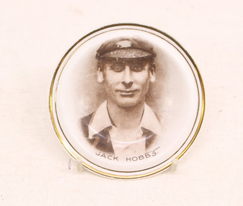Cricket: An early 20th century, Jack Hobbs small ceramic pin dish, decorated with gilt and sepia