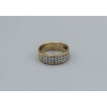 A 9ct gold and diamond three row ring, approximate total diamond weight 0.2ct), groos weight