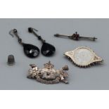 A selection of Victorian and later jewellery items comprising a Queen Victoria Jubilee brooch, in