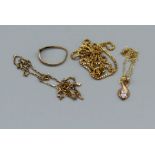 A selection of 9ct gold and yellow metal jewellery comprising a hallmarked complete box chain , a