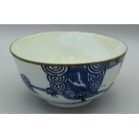 An 18th century Chinese blue and white bowl, with white metal rim, decorated underglaze with