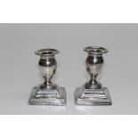 A pair of George III sterling silver candlesticks. Marked for London 1796, maker IT, possibly Tatum