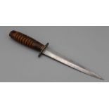 A WWII Fairburn Sykes RAF/ Commando fighting knife with ribbed wood handle and diamond section