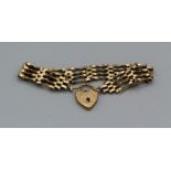 A 9ct yellow gold gate bracelet with padlock clasp. Gross weight approximately 15.3gm