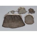 A set of four chain mail purses, two of which are hallmarked, weight approximately 162.1gm, two