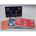 Four plastic sleeves with coinage sets of Great Britain including 1939-66-67 brass nickel 3p