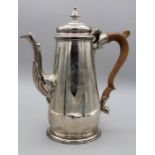 A sterling silver coffee pot, hallmarked for London 1781 with shellwork decoration and baronial