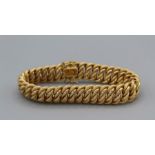 A double link Spiga bracelet, stamped 750 with Parisian eagle’s head mark, tested as 18carat gold