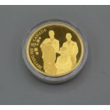 A 2014 Gold proof Royal Generations Canadian Dollar $200 coin. Struck to commemorate the birth of