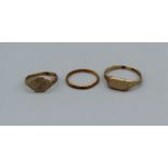 Three gold rings, two 9ct gold signet rings ( Gross weight approximately 4.4gm) plus a 22ct band