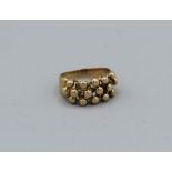 A 9ct gold chunky ball motif ring, approximate weight 8.3gm