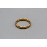 A 22ct gold wedding band, hallmarked London 1956, weight approximately 3.2gm, size K
