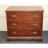 A small George III style mahogany chest, the crossbanded rectangular top over three long drawers,