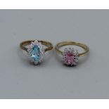 A pair of cubic zirconia dress rings in 9ct gold. Gross weight approximately 6.5gm