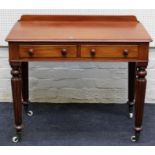 A Victorian mahogany side table, the rectangular top with low upstand over two frieze drawers with