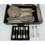 A boxed 4 piece silver backed vanity set, boxed set of silver teaspoons & 2 other teaspoons