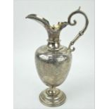 A Victorian ewer shaped claret jug, hallmarked London, 1862, maker George Fox