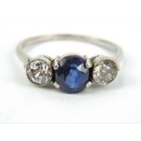 Platinum three stone diamond and sapphire ring. Size V.