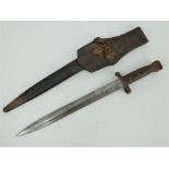 A British Pattern 1888 bayonet with steel mounted leather scabbard and leather frog