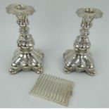 Pair of ornate Swedish silver plated candlesticks and similar cigarette case
