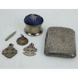 An Edwardian engraved silver cigarette case, three silver fobs & a pincushion