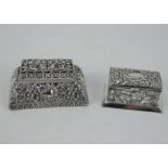 A Victorian repousse silver stamp box and an ornate sterling silver stamp box
