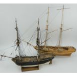 Two hand built wooden model fully rigged sailing ships.