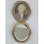 19th century portrait miniature of a gentleman in ornate silver & gold vanity case