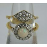 An 18ct gold white opal set ring and an 18ct gold diamond set ring.