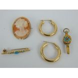 A 9ct gold mounted cameo brooch, 9ct gold earrings, 9ct bar brooch and gilt watch key