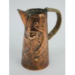 Newlyn copper Arts & Crafts jug with fish and scallop decoration