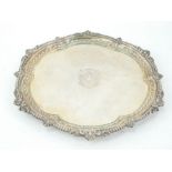 Large Edwardian silver salver with central armorial, hallmarked London 1905, Robert Pringle