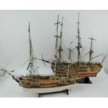 Two hand built wooden model fully rigged sailing ships.